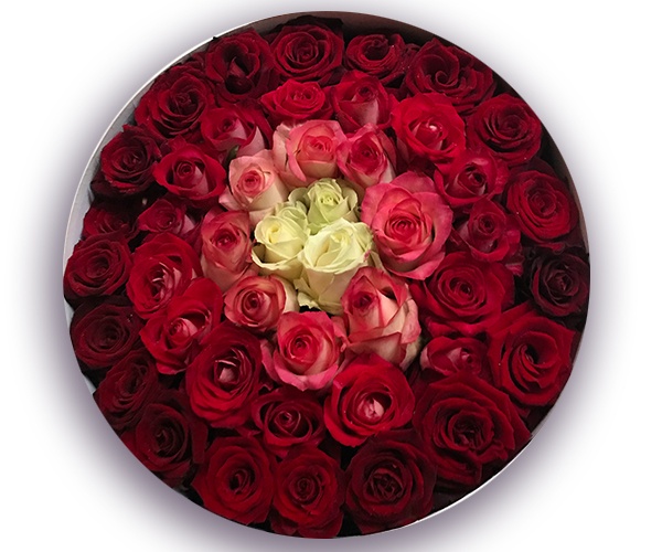 Кругла коробка з веселкою з чарівних троянд